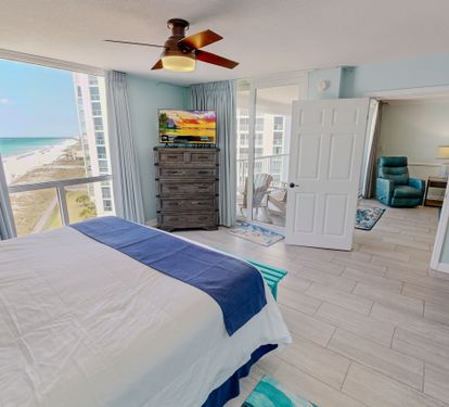 Wake up to stunning ocean views in your serene bedroom, where coastal breezes and soft morning light create the perfect start to your beach getaway.