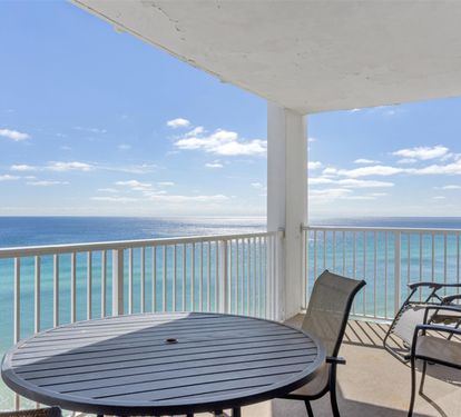 Your private balcony offers stunning ocean views where you can unwind with morning coffee or evening cocktails above turquoise waters.