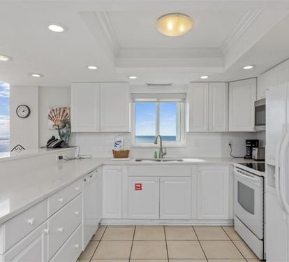 Cook with ocean breezes flowing through your bright, fully-equipped kitchen while gazing at endless sea views through the window.