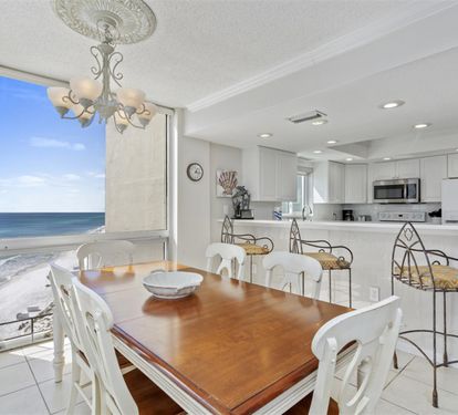 Wake up to stunning ocean views from your bright kitchen and dining area, where morning coffee tastes better with waves as your backdrop.