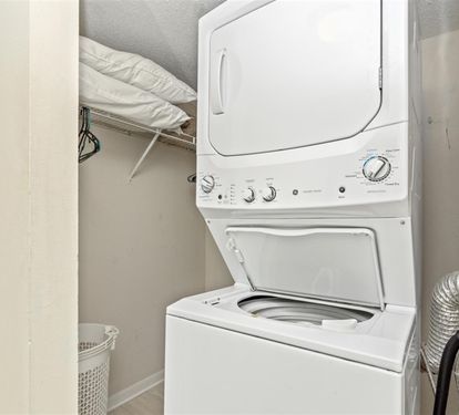 Your private laundry closet features a convenient washer-dryer combo, letting you pack light and keep your clothes fresh throughout your stay.