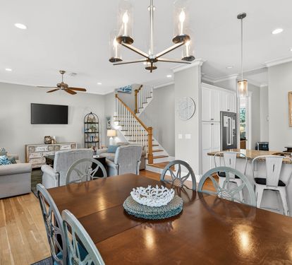 Relax in your open-concept haven where modern elegance meets coastal charm—perfect for gathering with loved ones.