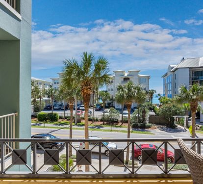 Private balcony with partial Gulf views, coastal breezes, and a relaxing overlook of Scenic 30A.