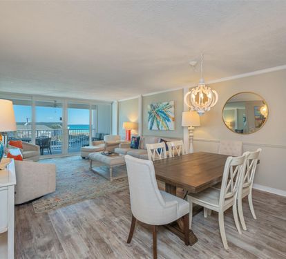 Unwind in your coastal retreat where sea views frame every meal and conversation in this beautifully appointed open living space.