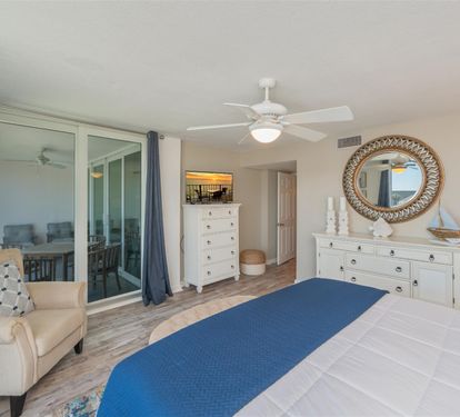Unwind in your coastal-inspired bedroom with ocean breezes from your private balcony and crisp linens for perfect rest.