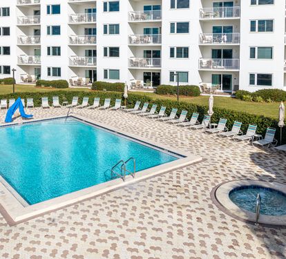 Sparkling pool and spa await your perfect beach getaway at this oceanfront resort.