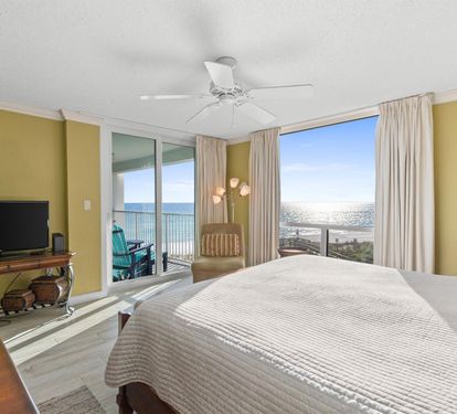 Wake up to stunning ocean views from your private balcony. Relax in comfort with a flat-screen TV and coastal breeze.