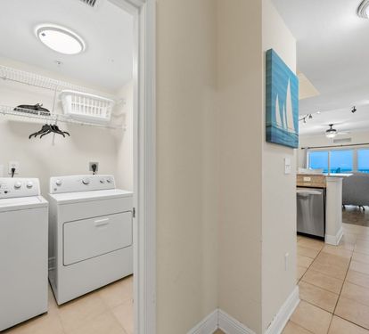 Crystal Tower 1604 Laundry Room with Full Size Washer Dryer