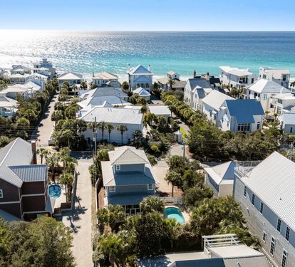 Charming coastal community with private pools just steps from pristine turquoise waters and white sand beaches.