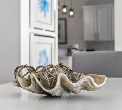 You'll love the elegant touches throughout this bright, modern space with its sleek kitchen and thoughtful coastal-inspired decor.