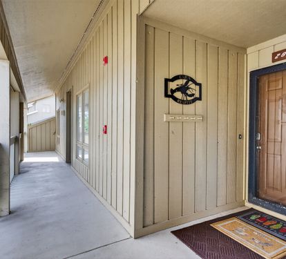 Welcome to Cajun Respite! You'll find your private entrance along this peaceful covered walkway, with your own decorated doorway ready to greet you.