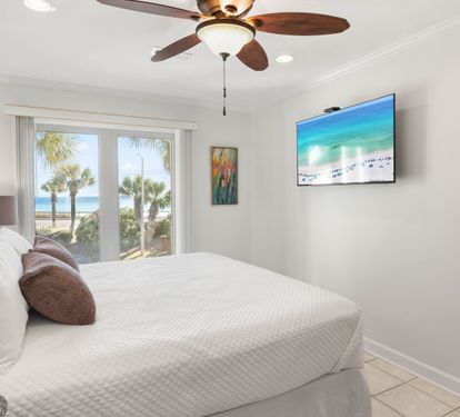 Wake up to stunning ocean views from your comfortable bed, with beach access just steps away through your private patio doors.