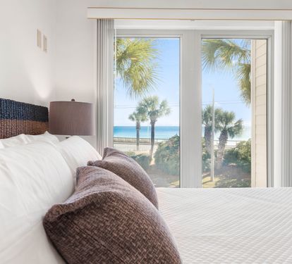 Wake up to stunning ocean views from your bed, with palm trees swaying just outside your window and pristine beach moments away.