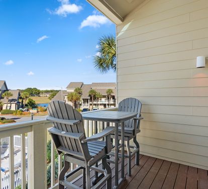 Sip your morning coffee on your private balcony while taking in peaceful resort views and swaying palm trees.