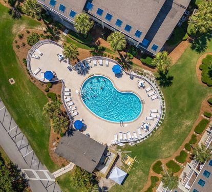Just steps from the community pool, this relaxing coastal getaway offers the perfect spot to unwind, soak up the sun, and enjoy resort-style amenities throughout your stay.