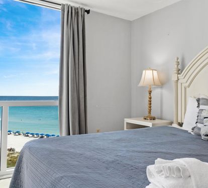 Wake up to breathtaking ocean views from your private bedroom, where pristine beaches stretch endlessly beyond your window.