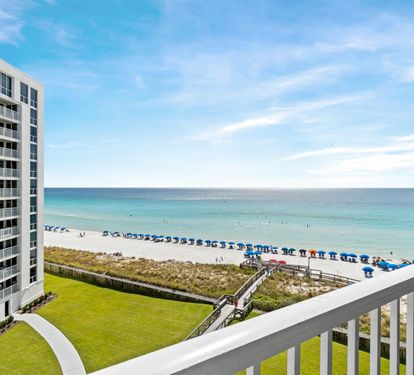 Wake up to stunning ocean views from your private balcony overlooking pristine white sand and crystal-clear waters.