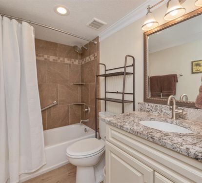 Your bathroom features granite countertops, a tub-shower combo, and plush towels—everything you need to refresh after a day of adventures.