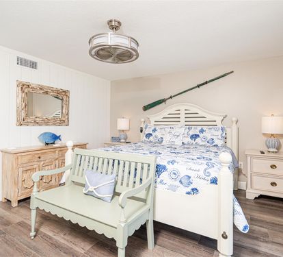 Drift into coastal dreams in this charming bedroom, where ocean-themed bedding and nautical touches create your perfect seaside retreat.