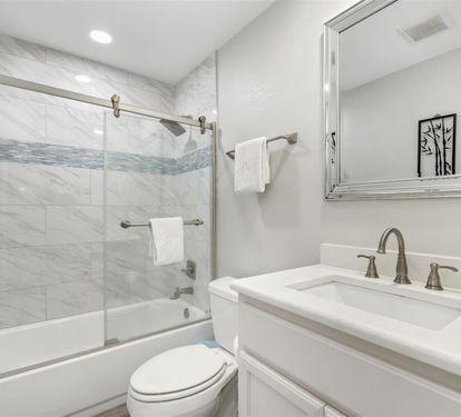 Refresh in your marble-appointed bathroom featuring elegant finishes, modern fixtures, and thoughtful touches for your comfort.