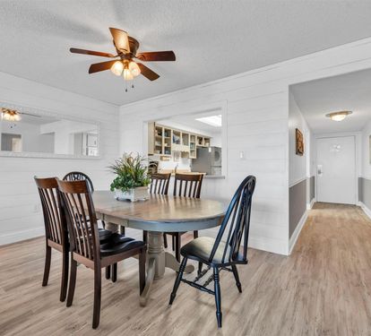 Gather around your elegant dining table with comfortable seating for six, perfect for memorable meals together.