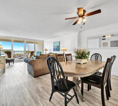 Your bright, open-concept living space flows seamlessly to an oceanfront balcony where you'll savor meals with stunning water views.