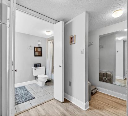 Step into your bright, clean bathroom with shower and modern amenities, perfectly designed for your comfort and convenience.