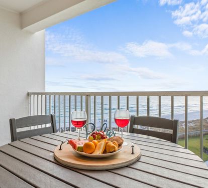 Sip wine and savor appetizers on your private balcony while taking in stunning ocean views that stretch to the horizon.