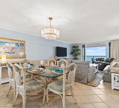 Relax in your elegant oceanfront living space with stunning sea views from your private balcony.