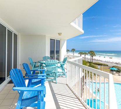 Soak up endless ocean views from your private balcony, where colorful beach chairs await your morning coffee and sunset cocktails.