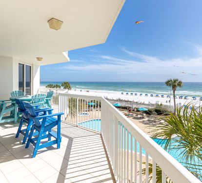Sip your morning coffee on your private balcony while watching gentle waves and colorful kites dance across the Gulf.
