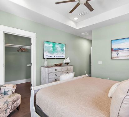 Private ensuite bathroom with a spacious vanity and walk-in shower for added comfort and convenience.