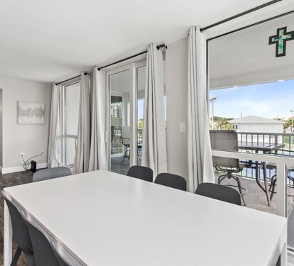 Your spacious dining area flows seamlessly to the private balcony, where you'll enjoy meals with refreshing outdoor views.