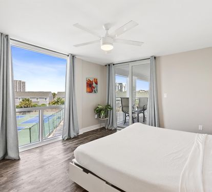 Wake up in your bright bedroom with stunning views and your own private balcony. The cooling ceiling fan keeps you comfortable.