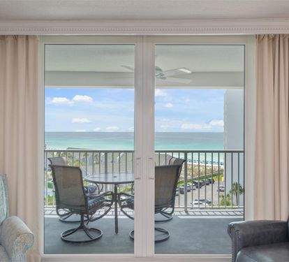 Wake up to stunning ocean views from your living room. Watch the waves through floor-to-ceiling windows while relaxing in comfort.