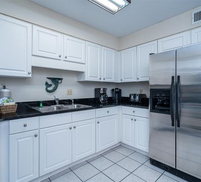 Your fully equipped kitchen awaits with stainless steel appliances, granite counters, and everything needed for memorable meals during your stay.