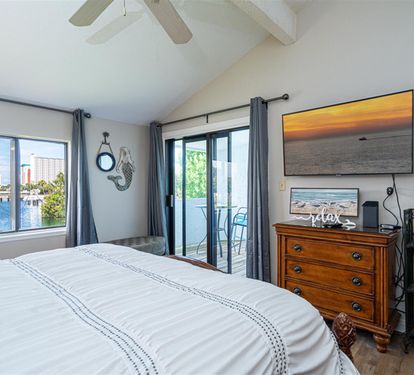 Wake up to stunning water views from your comfortable bed, with direct balcony access for morning coffee while watching the sunrise over the water.