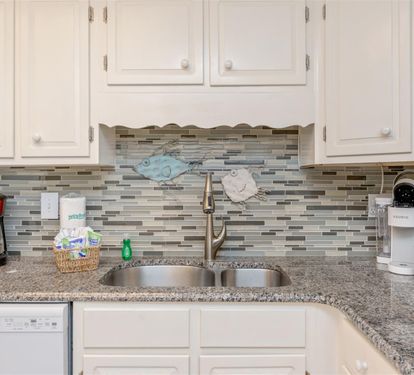 Your fully equipped kitchen awaits with granite counters, modern appliances, and thoughtful touches for preparing meals during your stay.