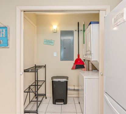 Your own convenient laundry room keeps everything fresh and organized, complete with beach-themed touches that add charm to everyday tasks.