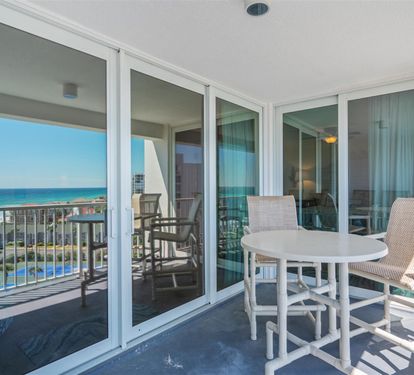 Sip your morning coffee while gazing at endless turquoise waters from your private balcony sanctuary.