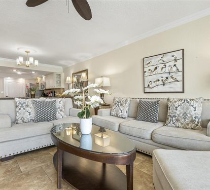 Unwind in your elegant living room where plush seating and tasteful decor create the perfect space for relaxation and conversation.