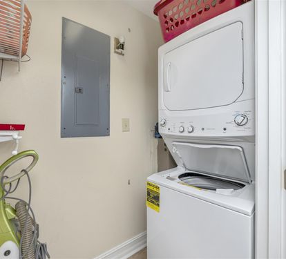 Your own in-unit laundry means fresh clothes throughout your stay, with convenient storage above for all your essentials.