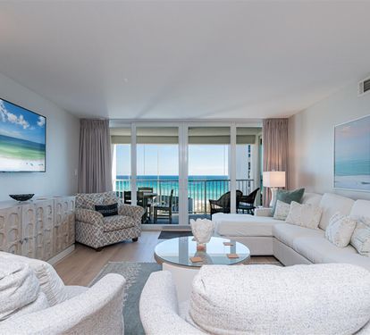Relax in your oceanfront living room with stunning sea views through floor-to-ceiling windows and your private balcony awaiting.