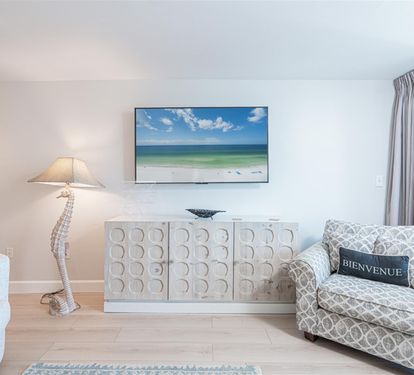 Sink into coastal comfort with beach-inspired décor and ocean artwork creating your perfect seaside retreat.