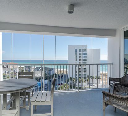 Sip your morning coffee while soaking in stunning sea views from your private balcony, complete with comfortable seating and dining space.