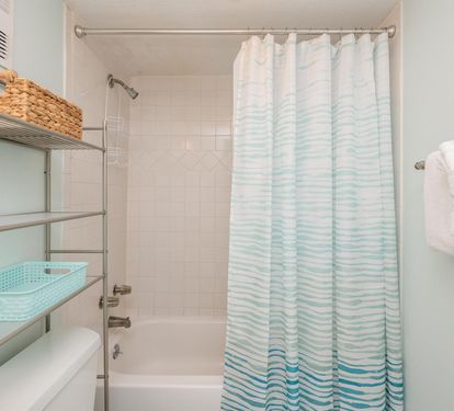 Refresh in your private bathroom with thoughtful storage and fluffy towels ready for your stay.
