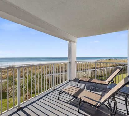 Relax on your private balcony as you watch waves roll onto pristine sand, feeling ocean breezes and endless tranquility.