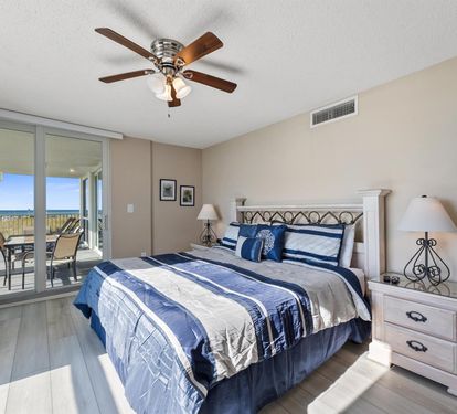 Wake up to ocean views from your king bed, with sliding doors opening to your private balcony overlooking the beach.