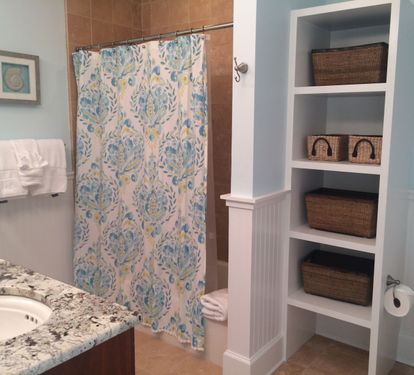 Large Second Master bath with double sinks and shelving unit