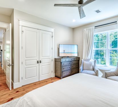 Primary King Suite - Equipped with a Flat-Screen TV & Seating Area